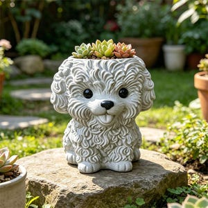 May include: A light gray, textured planter shaped like a curly-haired dog with large black eyes and a small tongue. The dog-shaped vessel holds a cluster of small, green and pink succulent plants nestled within the top of its head.