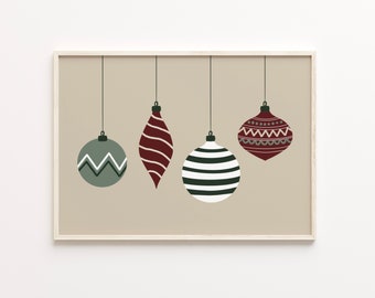 May include: A framed print with a beige background featuring four Christmas ornaments hanging from strings. The ornaments are a striped red and white, a black and white striped, a green with a white zigzag pattern, and a red with a white and gray pattern.