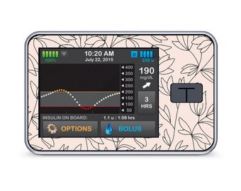 May include: A white and black floral patterned skin for a medical device with a digital display showing a blood sugar reading of 190 mg/dL, a time of 10:20 AM, and a date of July 22, 2015. The device also shows a graph of blood sugar levels over time, a button labeled "BOLUS", and a button labeled "OPTIONS".