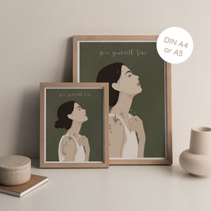 May include: Two framed prints with a green background and a woman with flowers on her arm. The text on the prints reads "give yourself time".