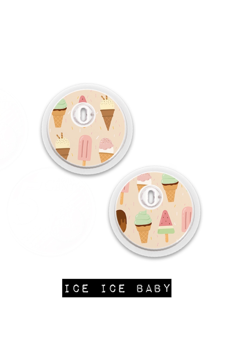 May include: Two white circular medical devices with ice cream cone and popsicle patterns. The text "ICE ICE BABY" is printed in a black rectangle below the devices. The ice cream cones are brown and green.
