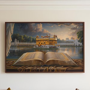 May include: A framed painting depicting a golden temple reflected in a still body of water. An open book with text lies in the foreground, suggesting a religious theme.