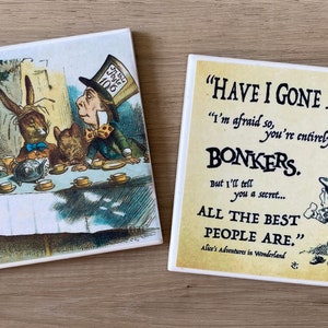 ALICE IN WONDERLAND COASTER RED QUEEN MATCHES OUR BOOKS & BAGS NEW IN CELLO ALICE IN WONDERLAND COASTER RED QUEEN MATCHES OUR BOOKS & BAGS NEW IN CELLO