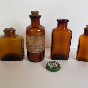 Set of 4 Small Amber Cork Top Glass Antique Apothecary Bottles