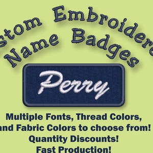 May include: Custom embroidered name badges in navy blue with white lettering. The sample badge says "Perry". Multiple fonts, thread colors, and fabric colors are available. Quantity discounts and fast production are offered.