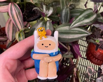 Finn the Human/mini Jake the dog/Adventure time