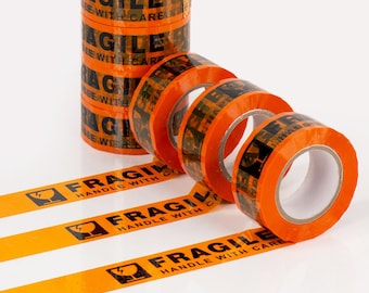 May include: Orange packing tape with black text that reads "FRAGILE HANDLE WITH CARE" and a black lightning bolt and glass icon. The tape is rolled up and ready to be used.