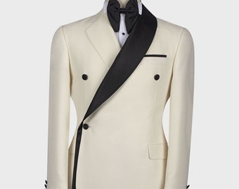 May include: A white double-breasted suit jacket with a black satin shawl collar and a black bow tie.