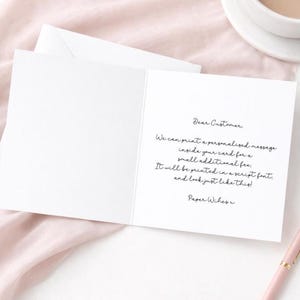 May include: A white greeting card with black script text that reads: Dear Customer. We can print a personalized message inside your card for a small additional fee. It will be printed in a script font, and look just like this! Paper Wishes x.