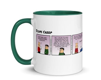 May include: White ceramic coffee mug with a green rim. The mug features a black and white comic strip illustration of a programmer discussing scope creep with a client. The comic strip text reads "SCOPE CREEP", "ARE THESE USER SPECIFICATIONS COMPLETE?", "NO, I PLAN TO ADD REQUIREMENTS AS YOU BUILD THE APP UNTIL YOU HAVE NO HOPE OF SUCCESS AND YOU FANTASIZE ABOUT STRANGLING ME", and "DO YOU KNOW WHAT ISN'T AS REFRESHING AS YOU'D HOPE? HOMS".