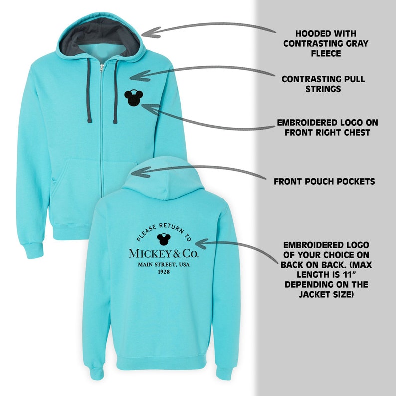 May include: A turquoise blue hooded sweatshirt with a contrasting grey fleece lining. The sweatshirt has a zip closure, front pouch pockets, and a black embroidered Mickey Mouse logo on the front right chest. The back of the sweatshirt features a black embroidered logo that says "Please return to Mickey & Co. Main Street, USA 1928".