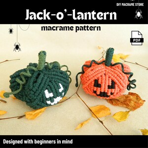 May include: Two macrame Jack-o'-lanterns, one green and one orange, with carved faces. The pumpkins have green stems and are set against a backdrop of autumn leaves. The text reads "Jack-o'-lantern macrame pattern" and "Designed with beginners in mind."