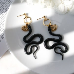 Black Gold Resin Snake Earrings Evil Eye