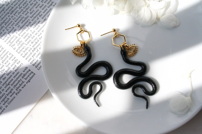 Black Gold Resin Snake Earrings Evil Eye