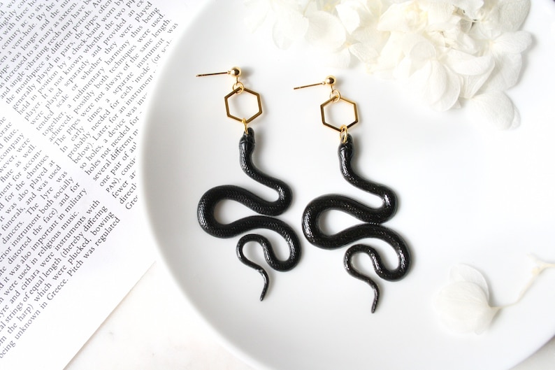 Black Gold Resin Snake Earrings None