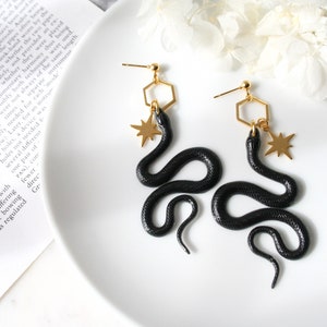 Black Gold Resin Snake Earrings North Star