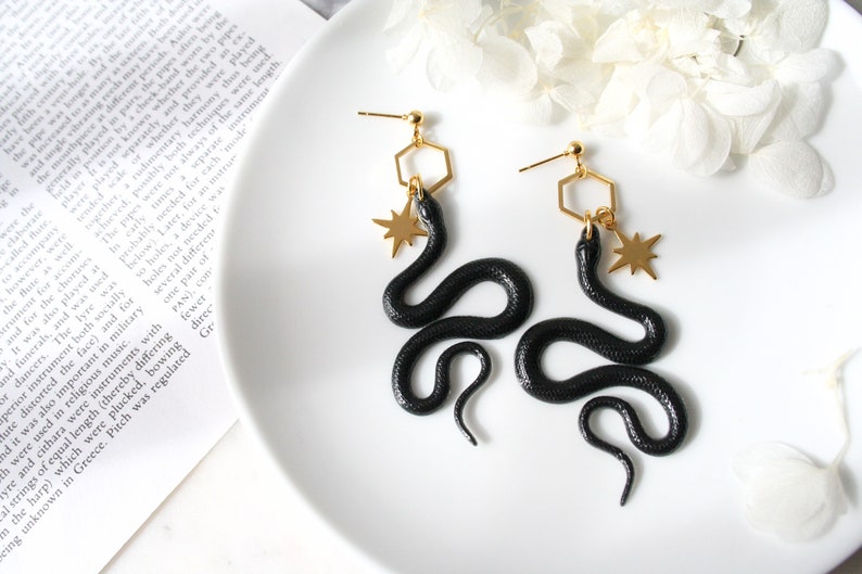 Black Gold Resin Snake Earrings North Star