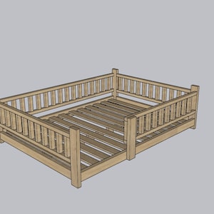 May include: A wooden bed frame with a slatted base and a decorative railing around the perimeter. The frame is made of light brown wood and has a simple, rustic design.