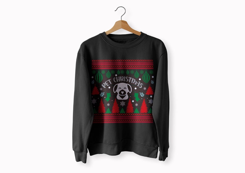 May include: Black Christmas sweater with a white dog silhouette and the text "Pet Christmas". The sweater has a red and green pattern with Christmas trees, snowflakes, and ornaments.