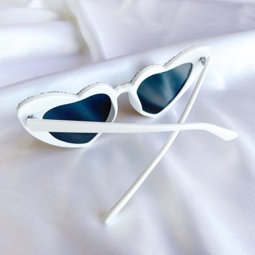 White, heart shaped, bedazzled sunglasses, perfect bridal accessory, bride sunglasses, bachelorette party, bach shops and boujee