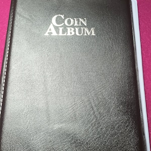 Coin album  Holds 60 coins