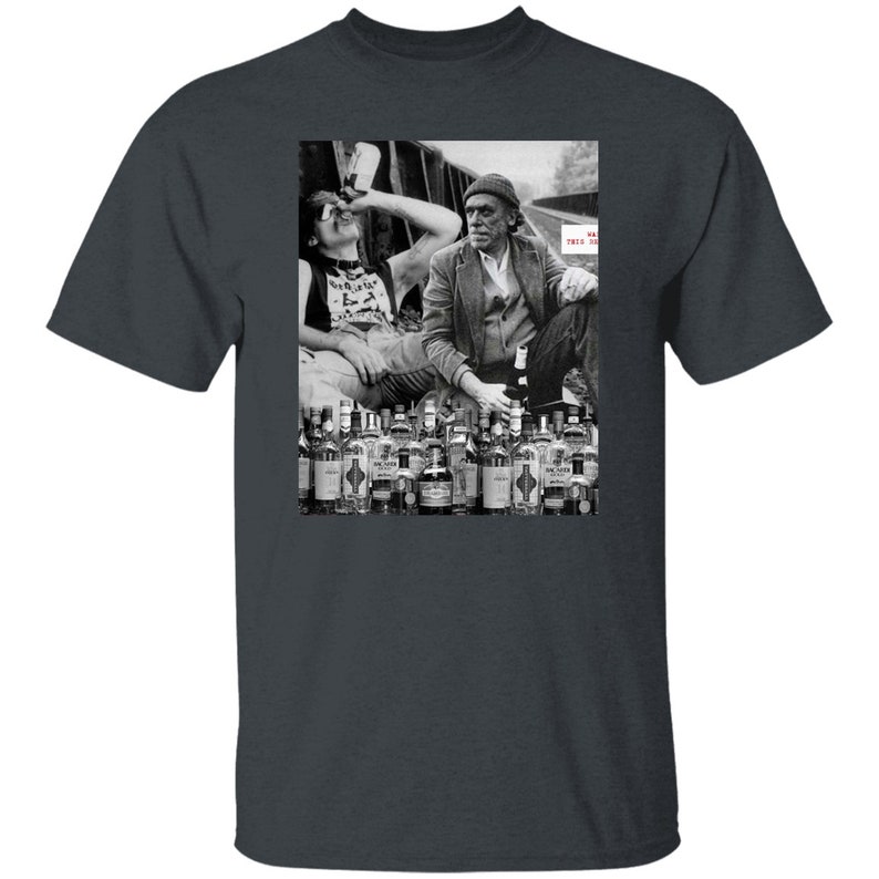May include: Black and white photo of two men sitting on a railroad track with a large number of liquor bottles in front of them. The text "This is our life" is visible in the image.