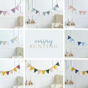May include: A collection of nursery bunting in various colors, including pink, blue, yellow, and green. Each bunting features triangular flags strung along a white cord. The image also displays the text "nursery BUNTING".