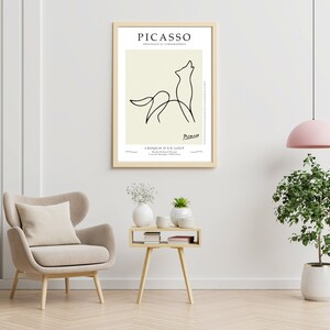 Pu&ograve; includere: Una stampa incorniciata di un disegno a linea di un lupo che ulula alla luna. La stampa &egrave; intitolata "Croquis d'un Loup" ed &egrave; firmata "Picasso".