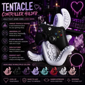 May include: A white tentacle controller holder supporting a black Xbox controller. The holder, with its unique tentacle design, is designed to hold Xbox, PlayStation, and Nintendo controllers. The image text reads "TENTACLE CONTROLLER HOLDER".