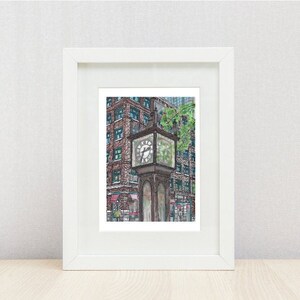 May include: A framed watercolor print of a city scene featuring a vintage clock tower. The clock has a square face and is set against a backdrop of a brick building with green-framed windows. Green foliage is visible.