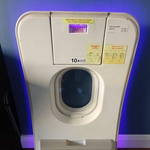 Upcycled Airbus A320 Emergency Exit Window Interior panel – Illuminated Aviation Wall Art