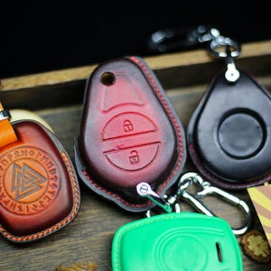 2025 Harley Porte-clés Etui en cuir Porte-clés fait main vintage Fat boy Road 2024 Glide Fob Cover emblèmes 883 X48 1200 Street Glide Fat boy
