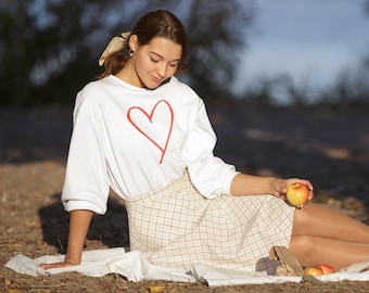 Sudadera Love Heart: mezcla de algodón con hombros descubiertos y cuello barco