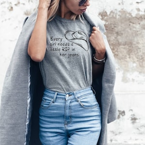 Every girl needs a little rip in her jeans tshirts | Rip wheeler tshirts | Yellowstone inspired tshirts | Tv show | Rip wheeler sweatshirts