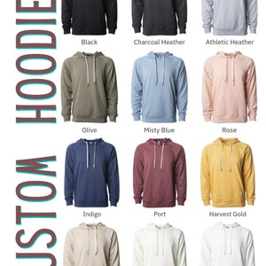 May include: A collage of 12 different colored hoodies. The hoodies are all the same style, with a drawstring hood and a kangaroo pocket. The colors are black, charcoal heather, athletic heather, olive, misty blue, rose, indigo, port, harvest gold, sand, bone, and white.