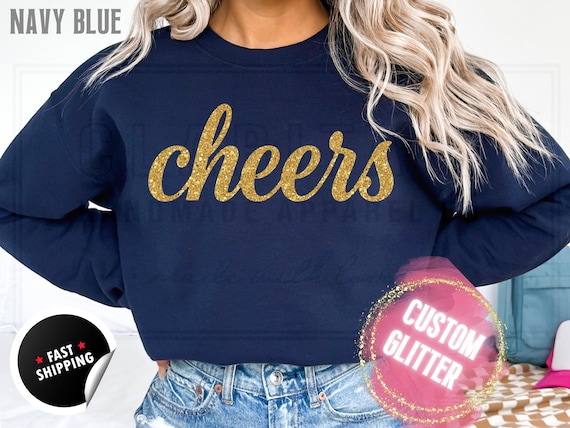 Glitter Christmas Sweatshirt and T-Shirts: Custom 'Cheers' Holiday Sweater in a Sparkly Glitz Text. Custom Color Sparkling Festive Shirts
