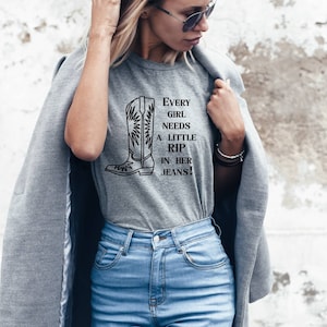 TV Inspired Shirt: Every Girl Needs a Little Rip in her Jeans, Cowboy Boot Graphic Tee