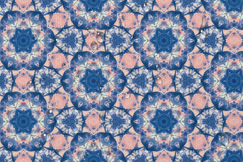 May include: A seamless pattern with a blue and pink mandala design. Water droplets are scattered across the surface.
