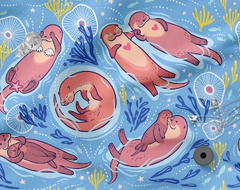 Peut inclure: Un tissu bleu avec un motif répété d'otaries roses se tenant l'une l'autre. Les loutres nagent dans un océan bleu avec des coraux blancs et jaunes et des étoiles de mer.