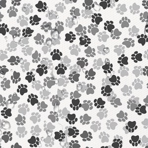 May include: A white background with a repeating pattern of gray and black paw prints. Water droplets are scattered across the surface.