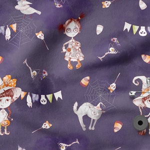 May include: A purple fabric with a repeating pattern of Halloween characters and objects. The pattern includes witches, a cat, a spider web, candy corn, and a girl with a doll.