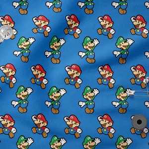 May include: A blue fabric with a repeating pattern of cartoon characters wearing red and green hats. The characters are wearing blue overalls and have brown hair and mustaches.