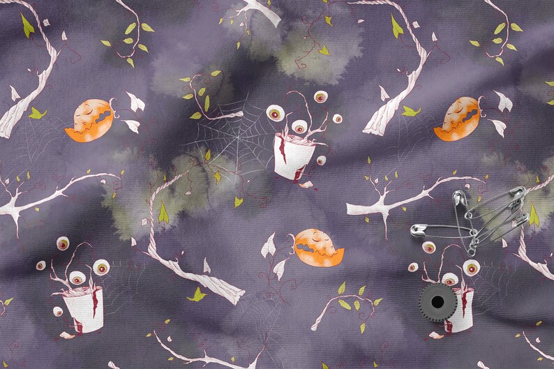 May include: A purple fabric with a Halloween-themed pattern. The pattern features orange jack-o'-lanterns, white branches, green leaves, and white spiderwebs. There are also white cups with red blood and eyeballs growing out of them.