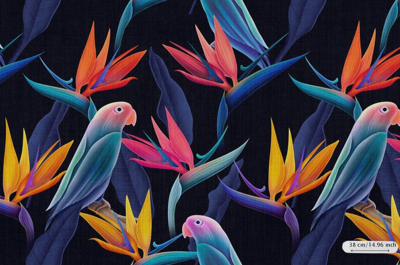May include: A seamless pattern featuring vibrant blue, orange, yellow, and pink bird of paradise flowers and blue and pink parrots on a dark blue background. 38 cm / 14.96 inch.