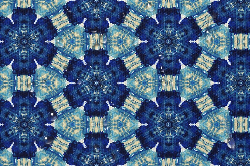 May include: A blue and white patterned background with a repeating geometric design. Water droplets are scattered across the surface.