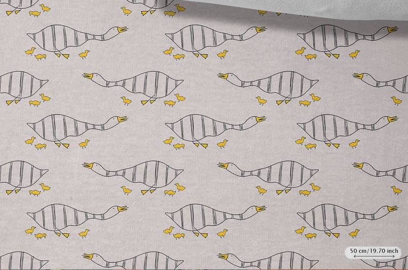 May include: A gray and white fabric with a repeating pattern of geese and goslings. The geese are striped and the goslings are yellow. The fabric is 50 cm (19.70 inches) wide.