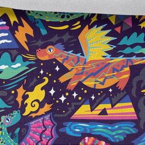 May include: A colorful fabric with a repeating pattern of dragons, mountains, and stars on a dark purple background. The dragons are in various colors, including red, orange, yellow, green, and blue. The mountains are in shades of pink, yellow, and blue. The stars are white. The fabric is 25 cm (9.85 inches) wide.