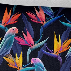 May include: A seamless pattern featuring vibrant blue, orange, yellow, and pink tropical birds and flowers on a dark blue background. The pattern is perfect for fabric, wallpaper, or other decorative projects.