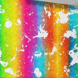 May include: Abstract rainbow pattern with white paint splatters. The background is a textured, light gray surface. The pattern is 50 cm / 19.70 inches wide.
