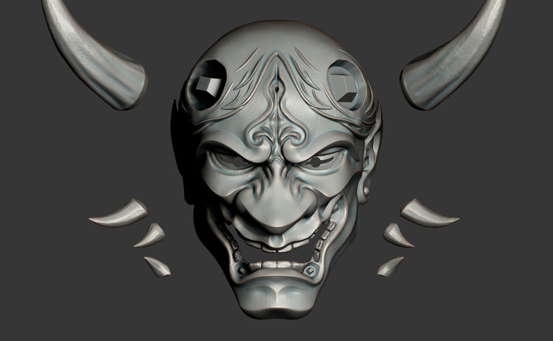 May include: A detailed, gray, 3D printed model of a Japanese Oni mask with horns. The mask has a fierce expression with a wide open mouth and sharp teeth. The horns are separate pieces.